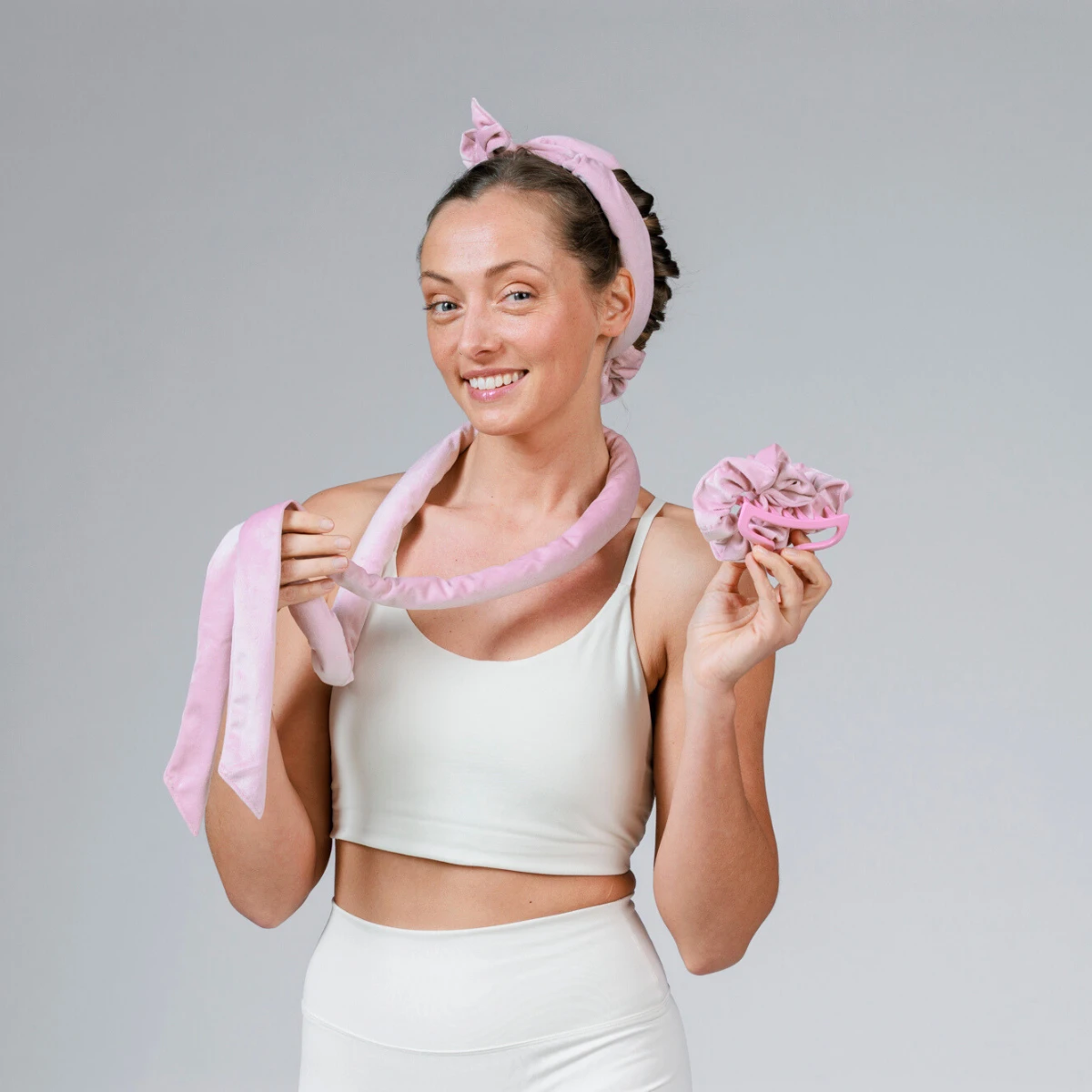 Nordenbeauty model holding the Heatless Hair Curler Set